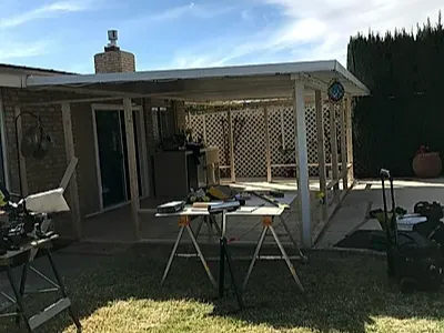Patio frame before enclosure — bare framing stage